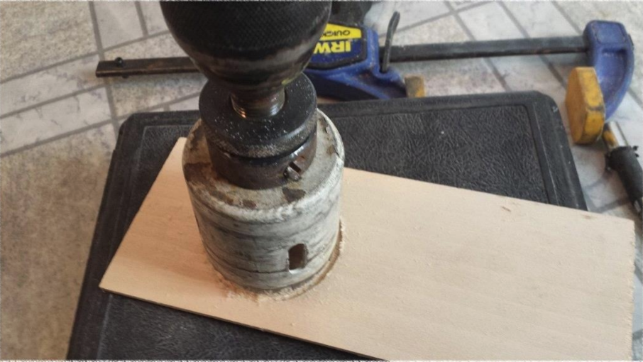 Door knob jig with its guide hole drilled