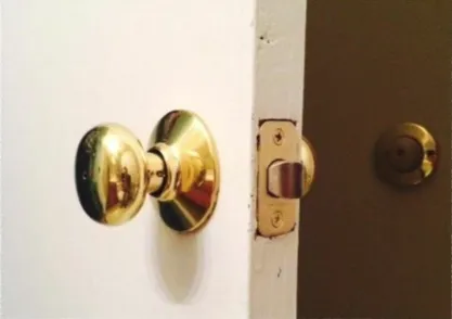 Modern door knob installed in the old door