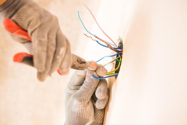 Install an outlet into a masonry wall